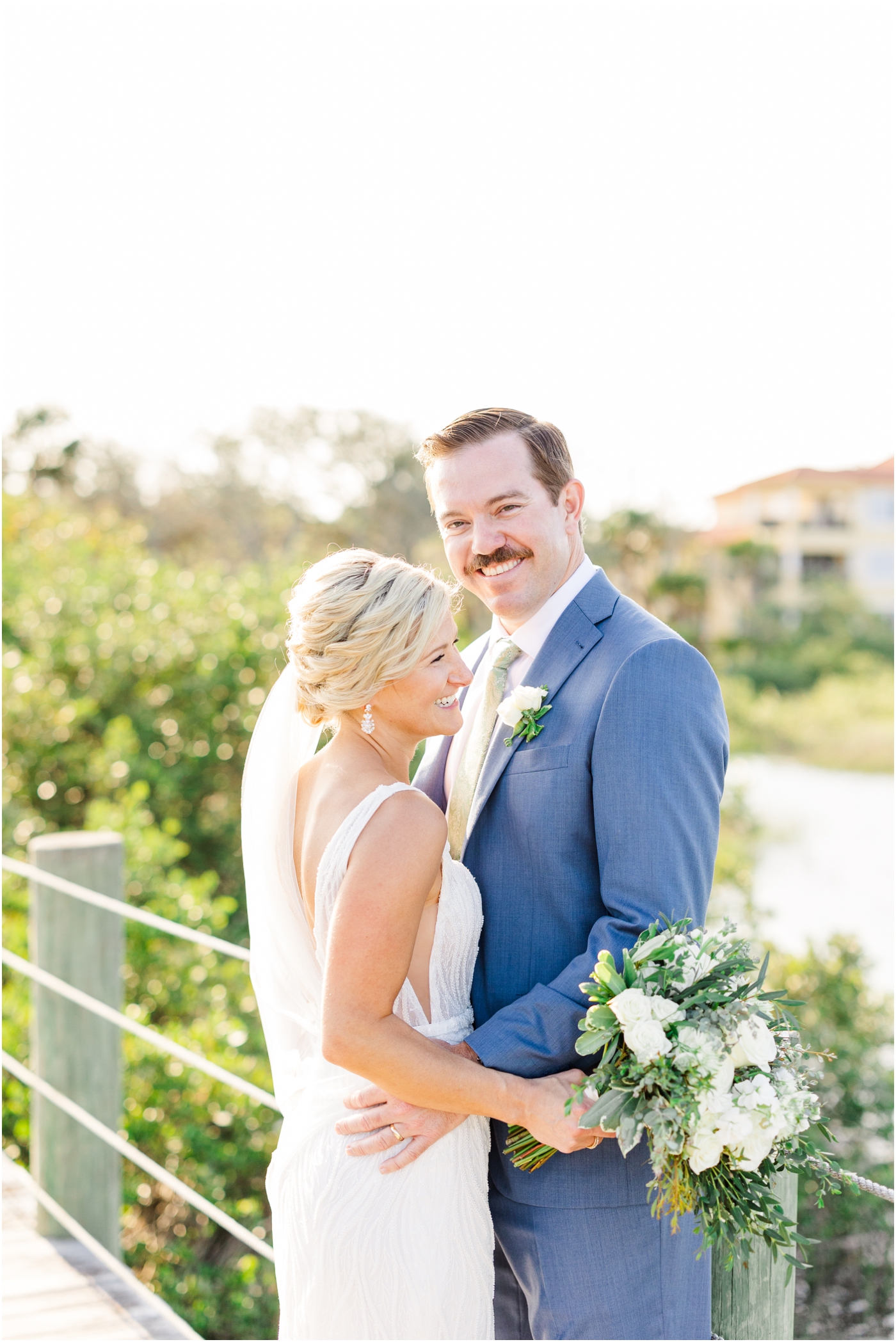 bride and groom photos on the dock at the fountain of youth | St Augustine Florida Wedding Photographer