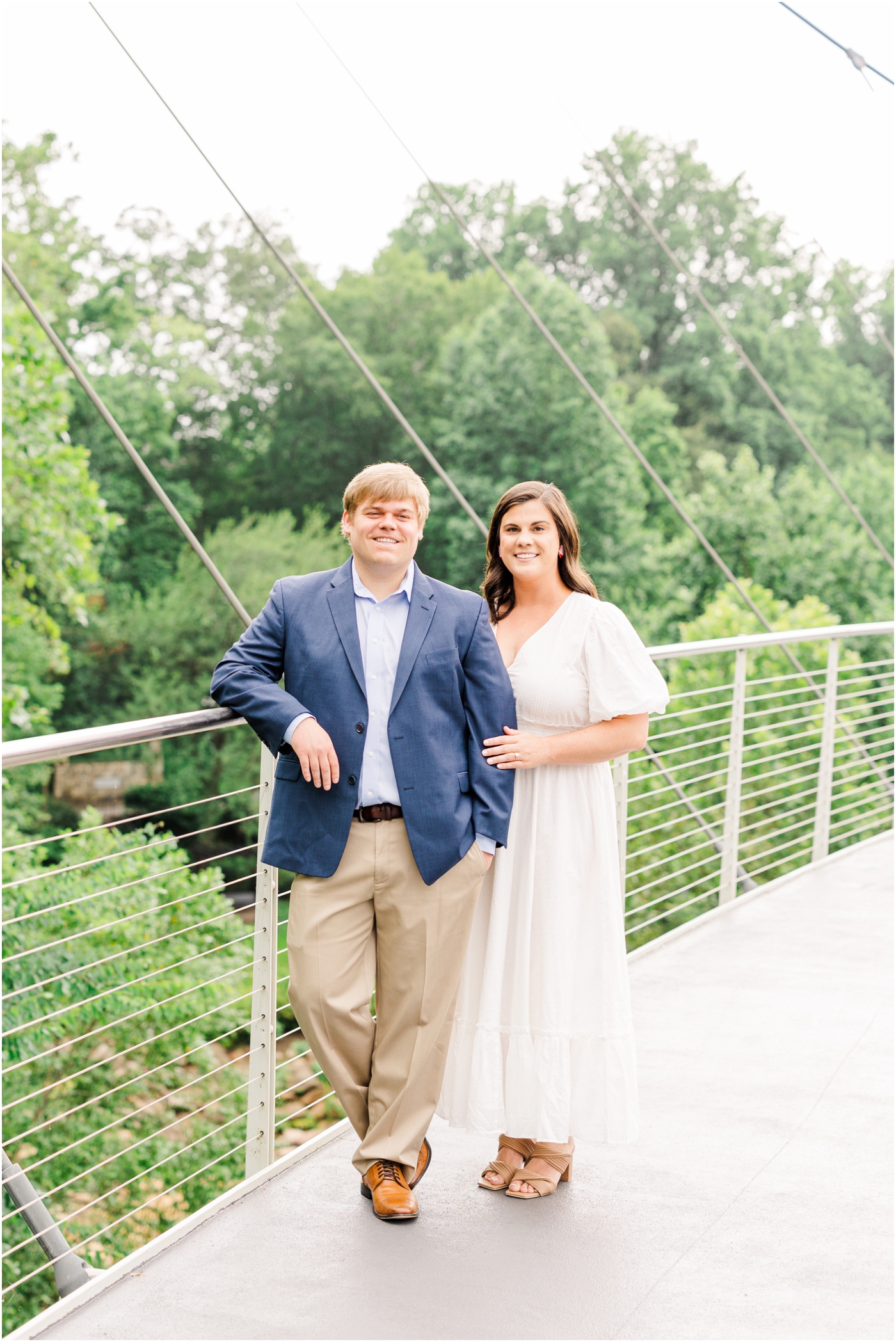 Engagement photos on the Liberty Bridge in Falls park