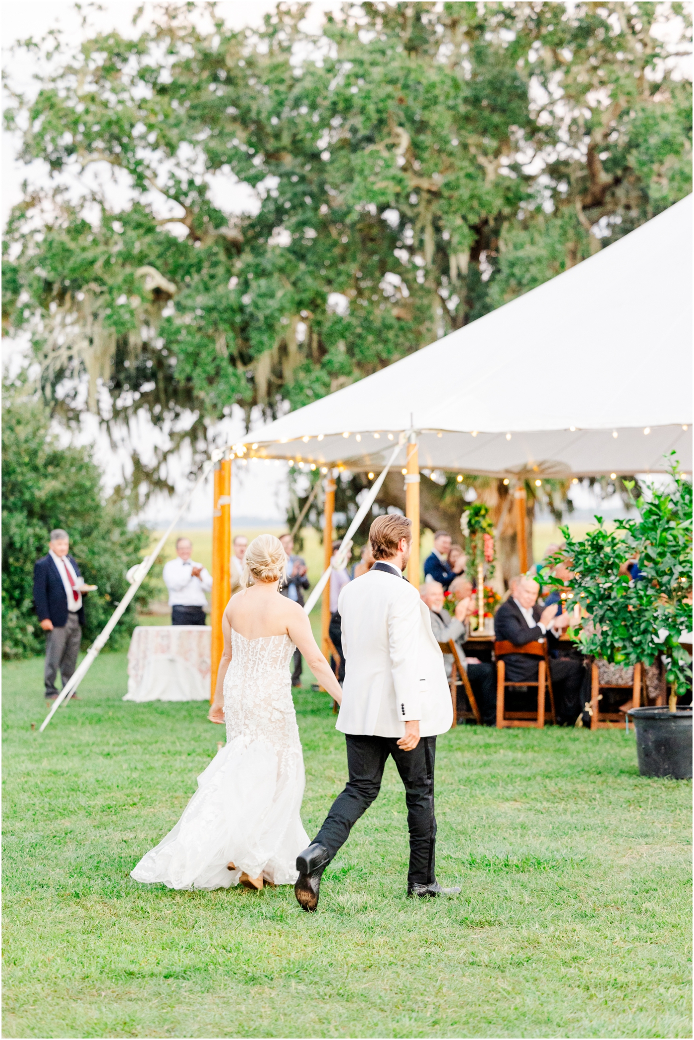 Sailcloth tent reception at an Agapae Oaks wedding in Beaufort, SC