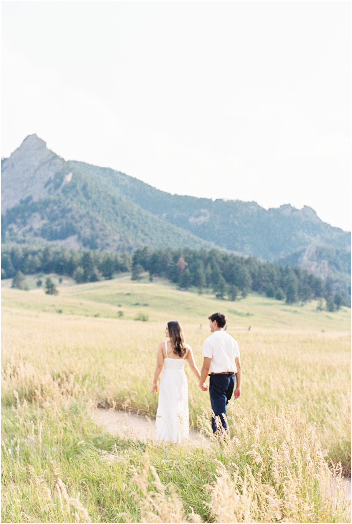 film photo of couple walking in Rocky Mountains Colorado 