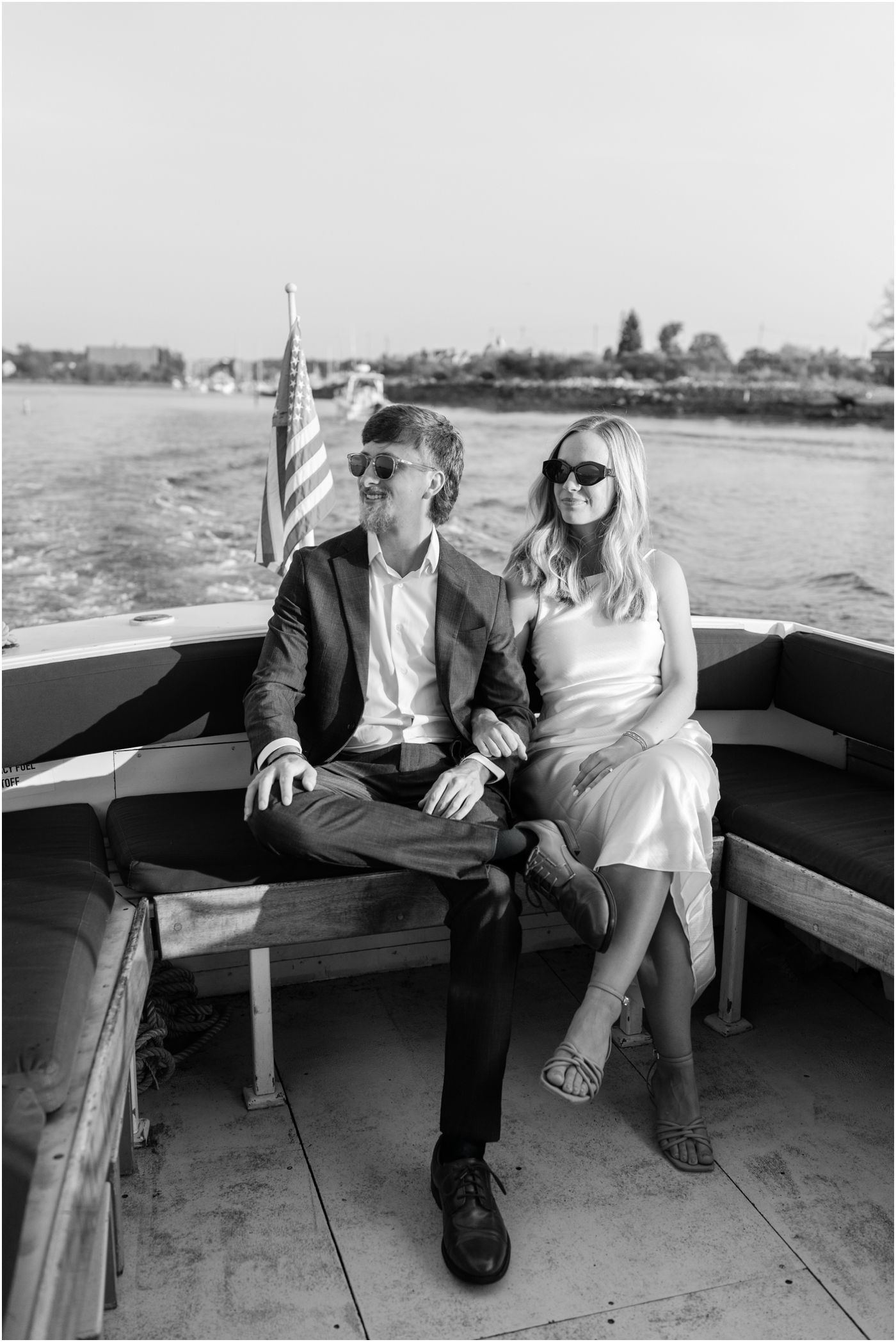 black and white photo of couple during boat session in Portland maine