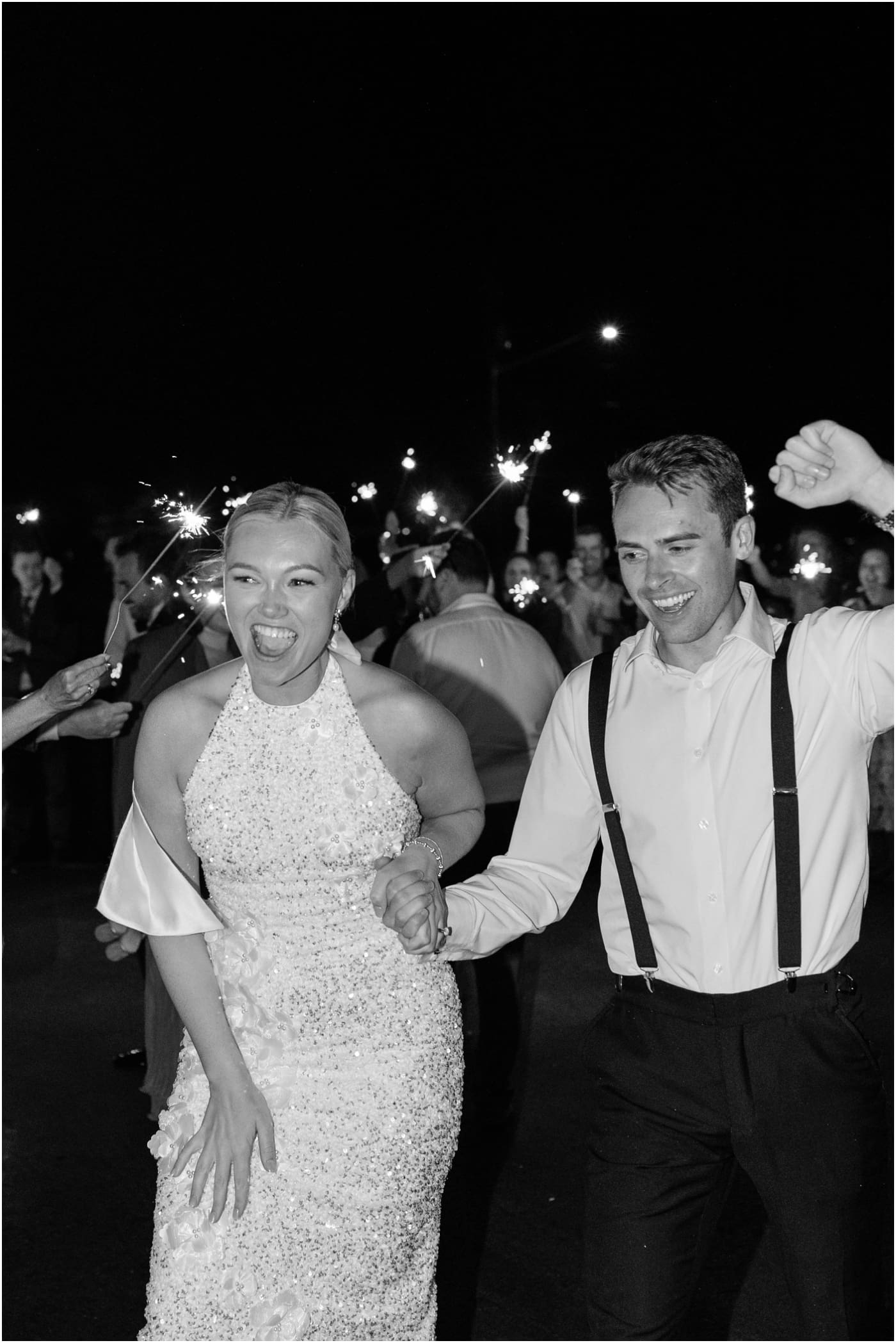 bride and groom exiting wedding at the coral bay club 