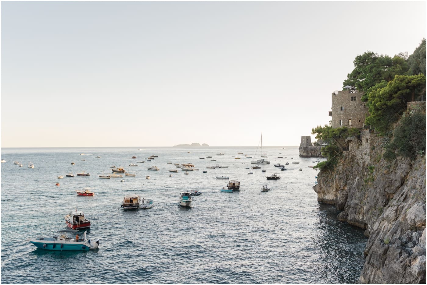 A view of boats in the water of the coast of Positano italy 