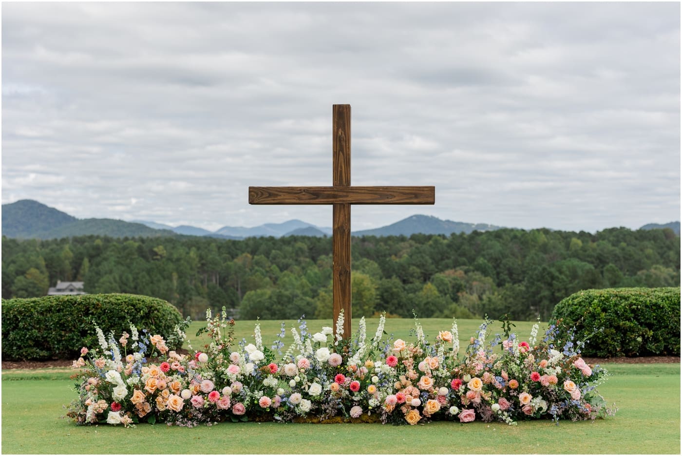 cross and meadow flowers at reserve at lake keowee wedding 